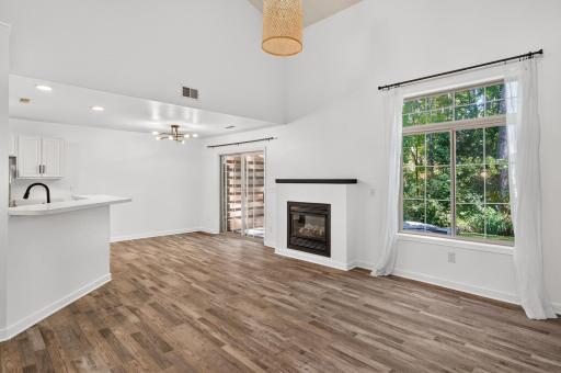 natural light and beautiful wooded view out back!