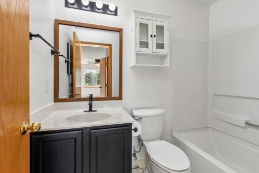 Primary bathroom with tile floors