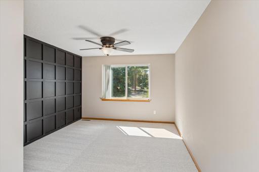 Primary bedroom with added character on walls