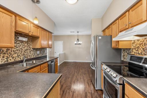 Upgraded feel with stainless-steel appliances in kitchen