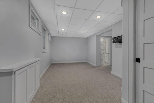 The third bedroom offers potential as a private primary suite with its own bath and large closet, or can easily be used as a second living room for added flexibility.