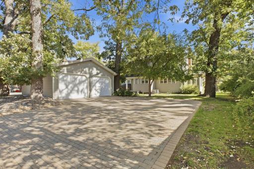 The extra space youâve been looking for! Enjoy an additional detached two-stall garage, spacious paver stone driveway, and plenty of additional off-street parking for vehicles or guests.