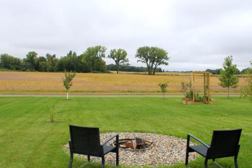 Overlooking a walking path and currently a field! Schedule your tour today!