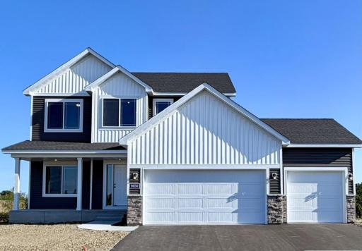 9650 32nd St NE - New Construction Home ready for a Quick Move-in! Highlights include a 4 Bay Garage (1,010 Sq. Ft) and Concrete Front Porch located on a Walkout Corner Homesite! Sod, Irrigation System, & Front Plantings included.