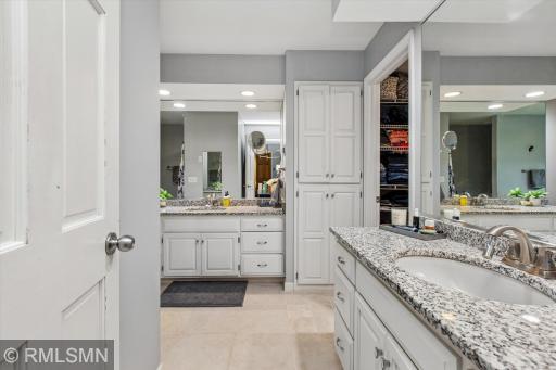 Amazing primary bath with two separate vanities, soaking tub and walk in shower!