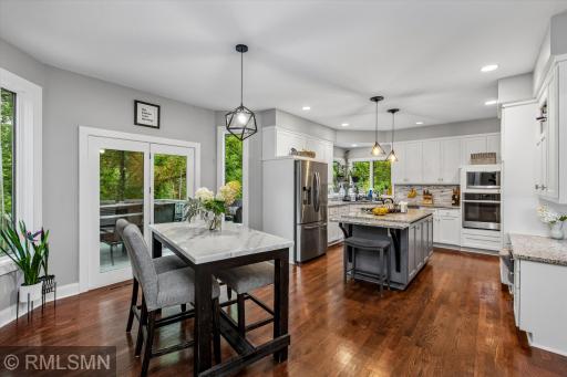 Eat in kitchen with patio door leading to the private back yard deck!
