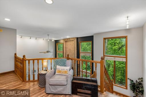 Upper level sitting area overlooking the main level family room