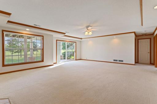 Family lower level walks out to patio