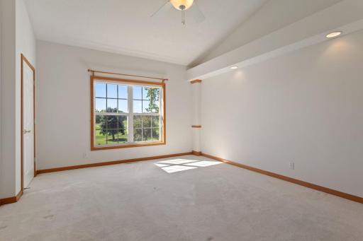 Master bedroom overlooks golf course
