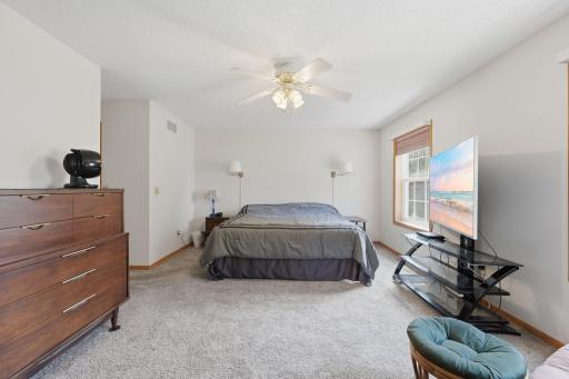 Oversized primary bedroom with walkin closet