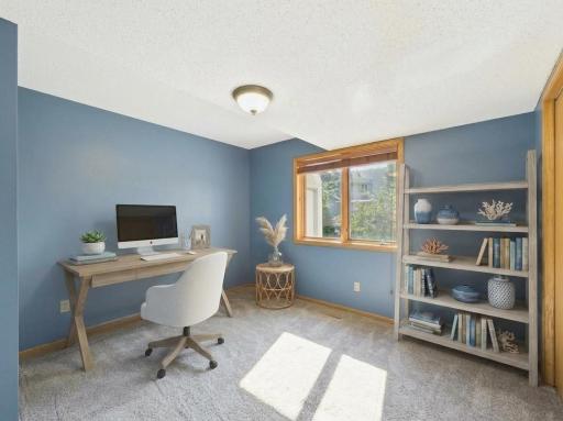 A main-level bedroom adds flexibilityâimagine a quiet home office, guest room, or bedroom. Virtually staged.