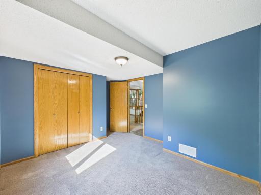 A true main-level bedroomâuse it as a bedroom, guest space, or consider a home-office setup.