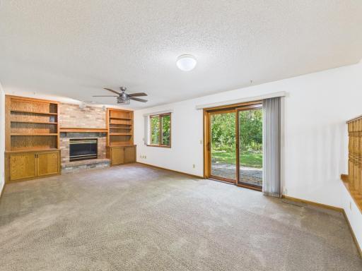 Custom built-ins and a gas fireplace make this main-level family room a natural place to settle in.