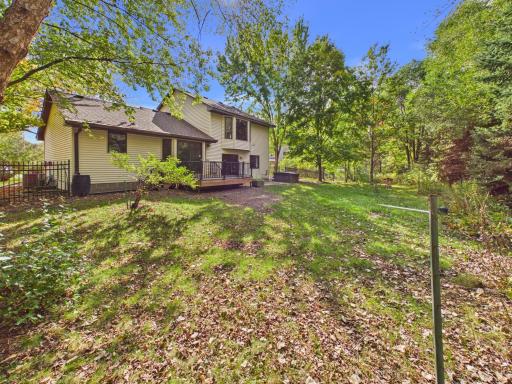 The rear exterior opens to the fenced backyard and outdoor living areas.