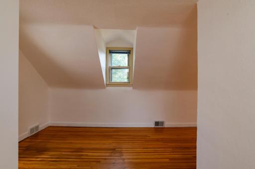 The large upper level multi use area has two end windows and two dormer windows for and abundance of natural light.