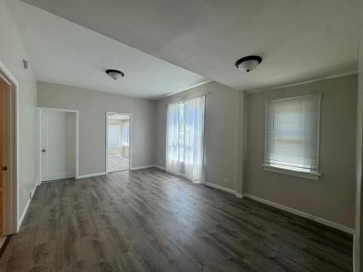 Updated kitchen with stainless steel appliances, quartz countertops & subway tile backsplash