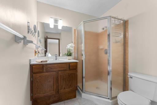 Private primary bath features an elevated comfort-height vanity