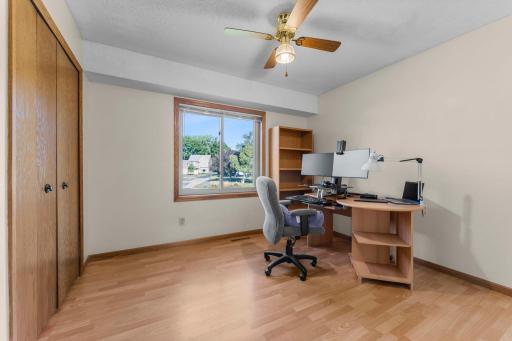 Three bedrooms on the upper level provide a functional main-level sleeping arrangement.