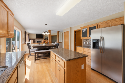 The kitchen offers a large walk in pantry, center island and plenty of cabinet space.