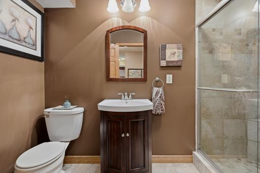 LL 3/4 Bath with a fully tiled step in shower