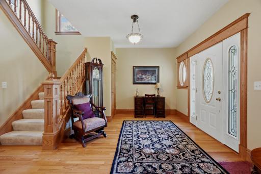 Foyer - Look at the Custom Woodwork, trim and gleaming Hardwood Floors