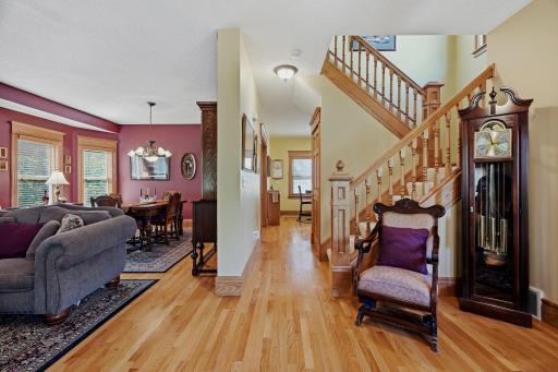Hardwood Floors, Custom Woodwork and an Open Staircase