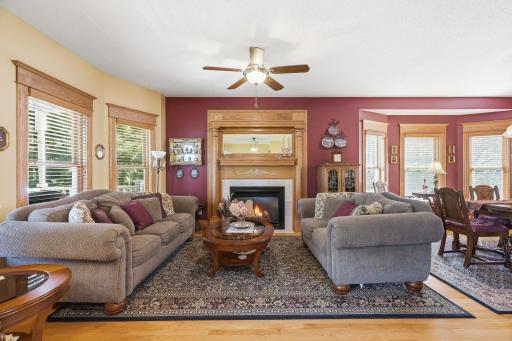Living Room with a Custom Double Oak Mantle with a Gas FP, Custom Oak 4" Casing and 8" Baseboards