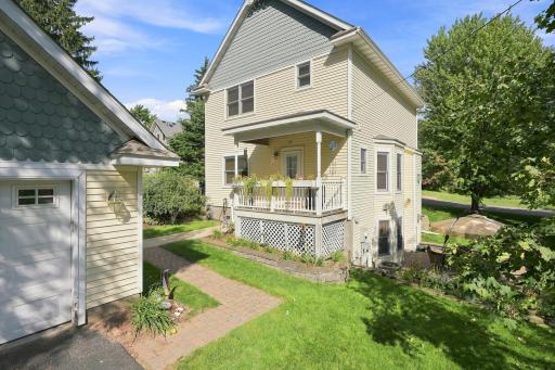 Back Porch and sidewalk to the 2 car garage