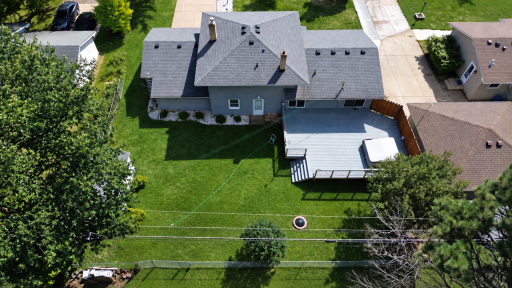 Aerial View- Backyard- Aerial view showcasing the home, spacious backyard and expansive 32' X 24' maintenance-free composite deck.