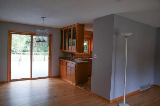 Dining Room- Showcasing a second access point to the out door living space.