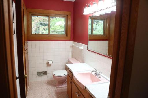 Up Stairs Main Bath- Pretty and pink.