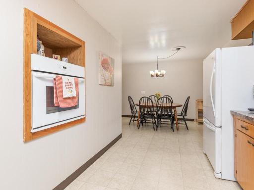 Kitchen flows directly into the adjoining dining area.