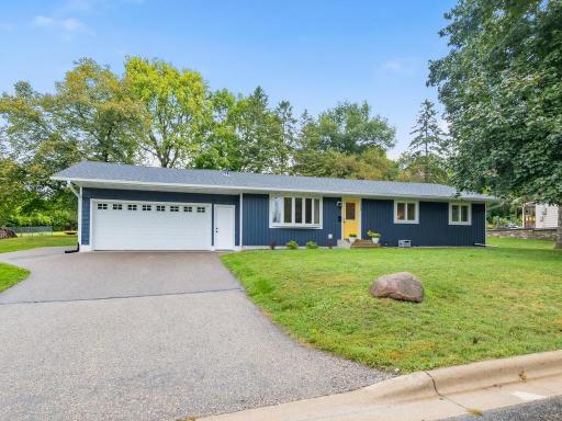 New roof and attractive two-tone siding create a fresh, updated exterior.