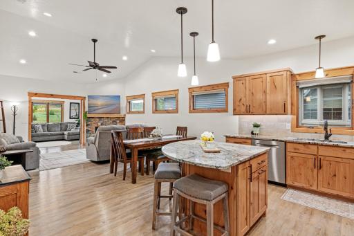 Island seating and nearby dining space make entertaining easy.