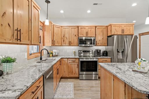 Plenty of cabinetry and counter space keeps the kitchen ready for everyday use.