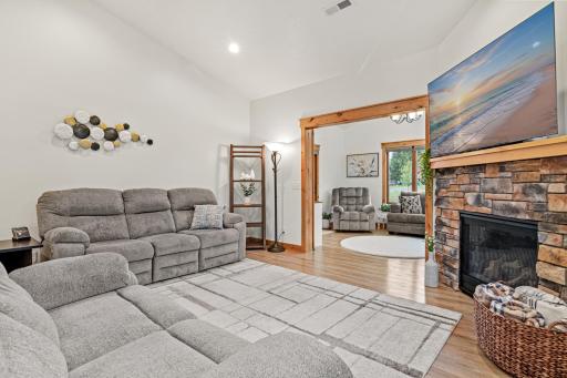 The living room opens to the sun room with sliding barn doors.