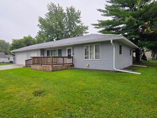 Located on corner lot with steel roof and gutter gurards