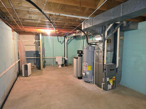 Utility room with half bath-shower and toilte