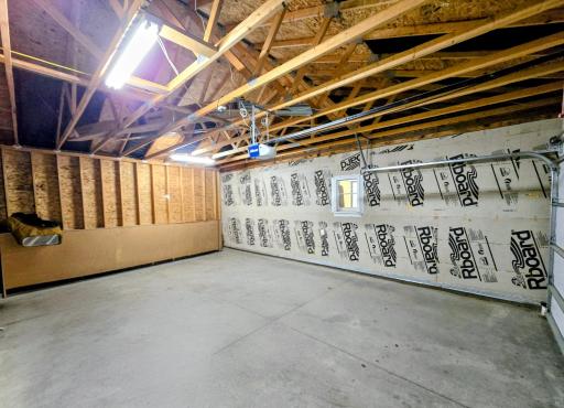 Double garage interior showing south interior wall.