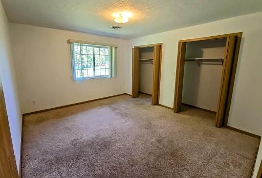 Closets are lighted and whole width of the wall 14x 12.