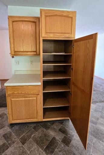 Love the pantry cabinet! Plus this would make a great coffee bar area too!
