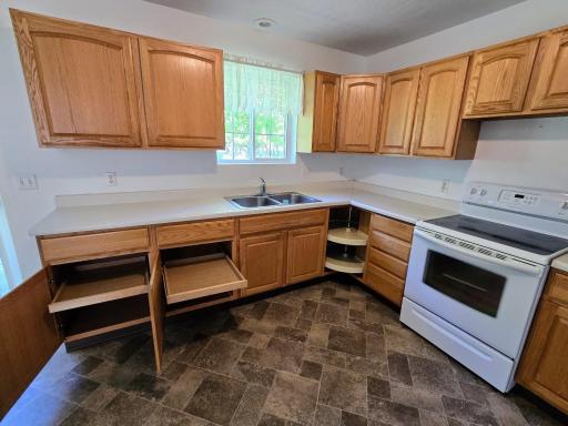 You will appreciate the pullout drawers and the corner lazy susan!