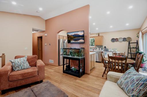 Living Room with newer flooring & recessed lighting