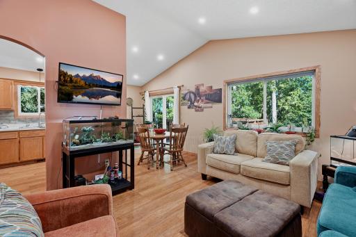 Living Room with newer flooring & recessed lighting