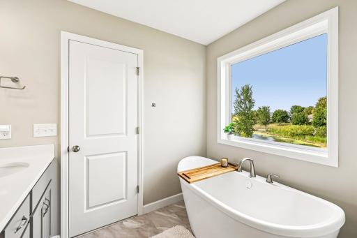 Separate soaking tub