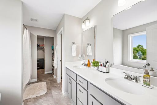 Primary bathroom and walk-in closet