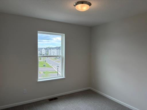 The secondary bedrooms are perfectly sized for everyone.