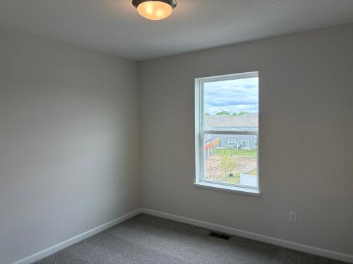 The secondary bedrooms are perfectly sized for everyone.