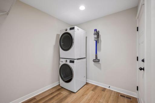 Mud room off the garage with laundry on the main floor.