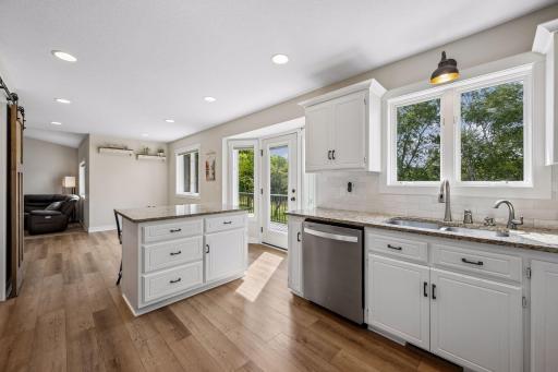 Tons of counter and cabinet space including a island with extra seating.
